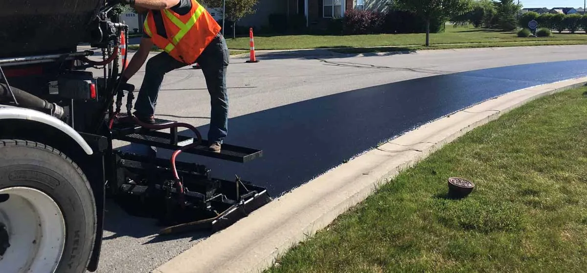 Sealcoating Aurora Illinois NSEW Asphalt maintenance co