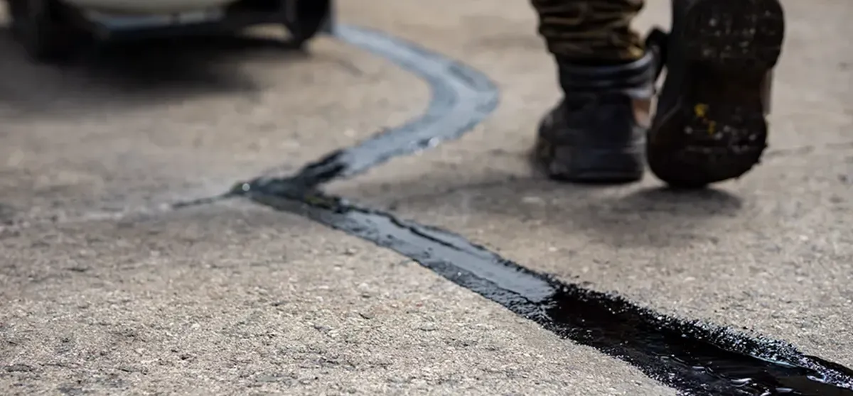 crack filling Aurora Illinois NSEW Asphalt maintenance co